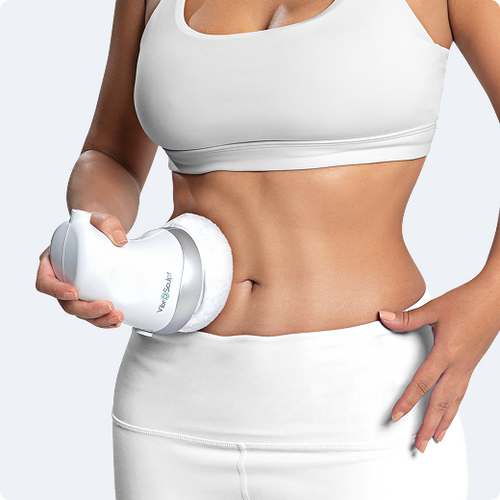 Vibro Sculpt en Abdomen Mujer aplicando Vibro Sculpt en el abdomen para masaje reafirmante y reducción de grasa